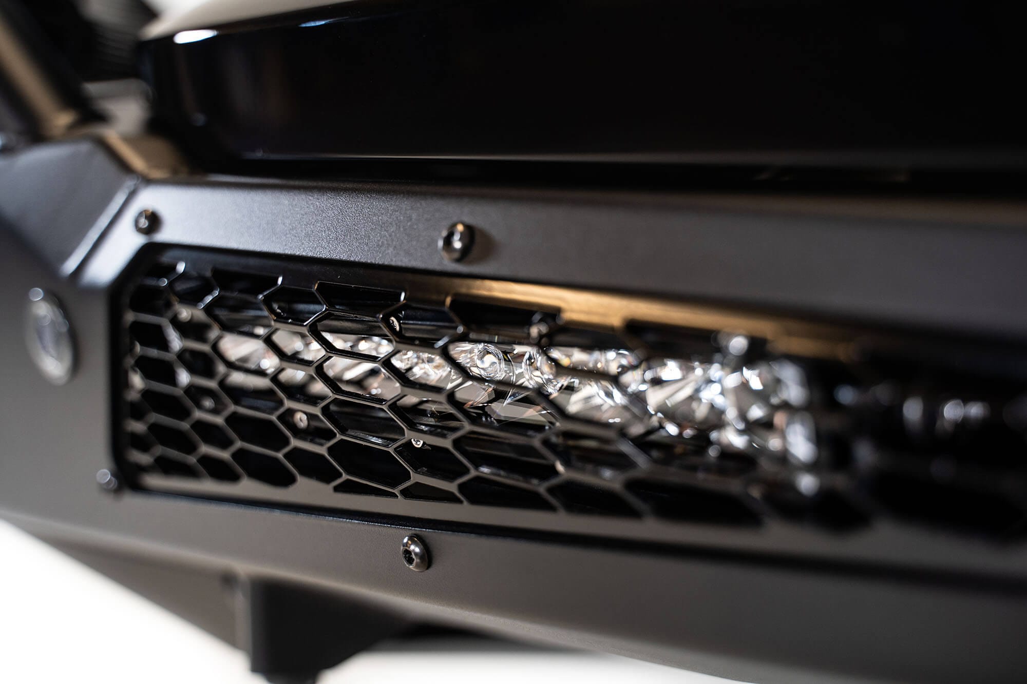 Addictive Desert Designs Bumper 2021+ Ford Raptor HoneyBadger Front Bumper w/ Hoop