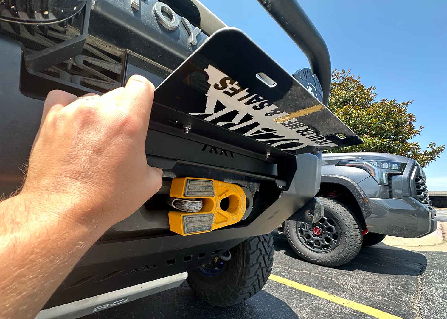 Backwoods Adventure Mods Recovery Gear Flip Up Front License Plate Holder - Hawse Fairlead