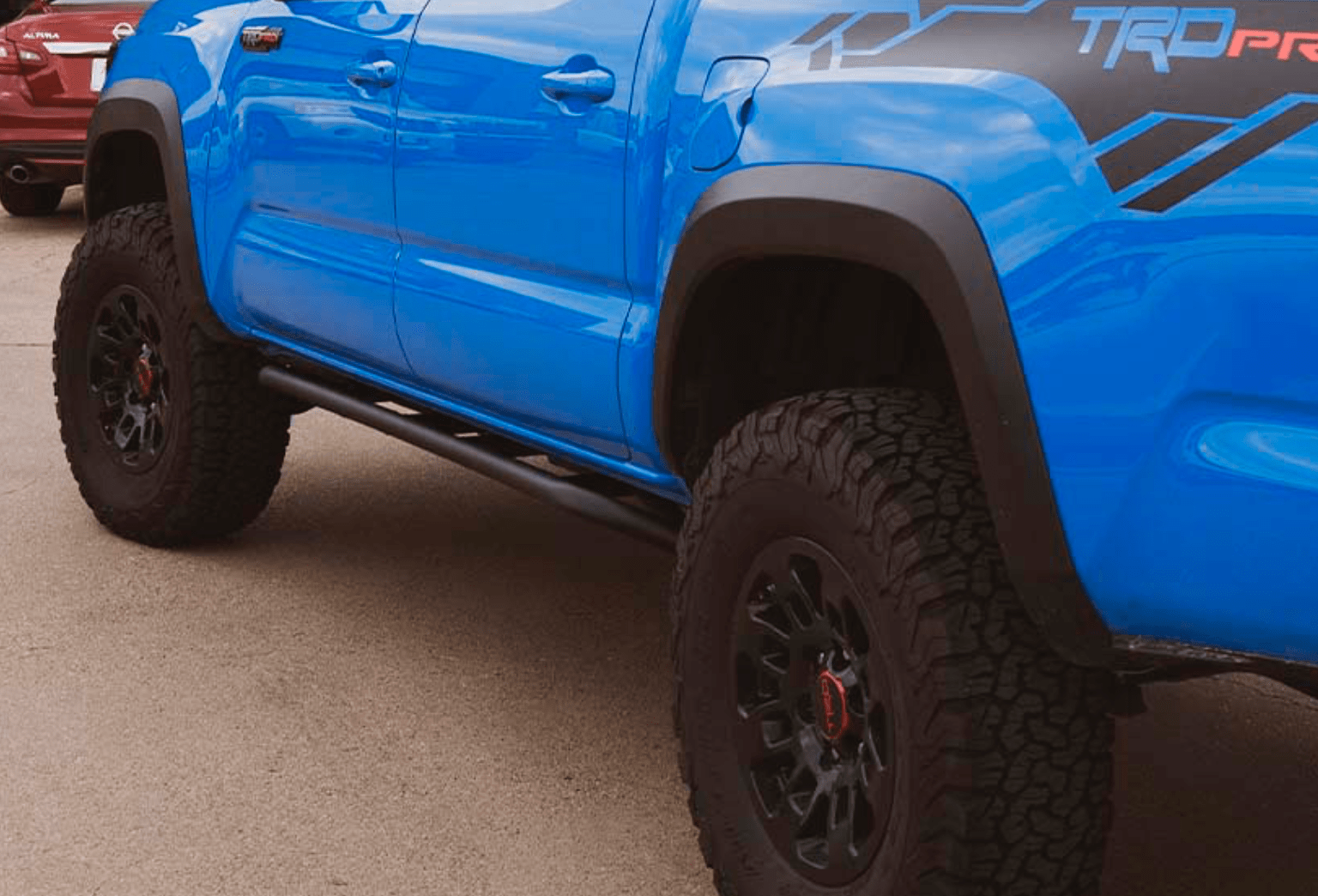 Cali Raised LED Armor 2005-2022 TOYOTA TACOMA TRAIL EDITION ROCK SLIDERS